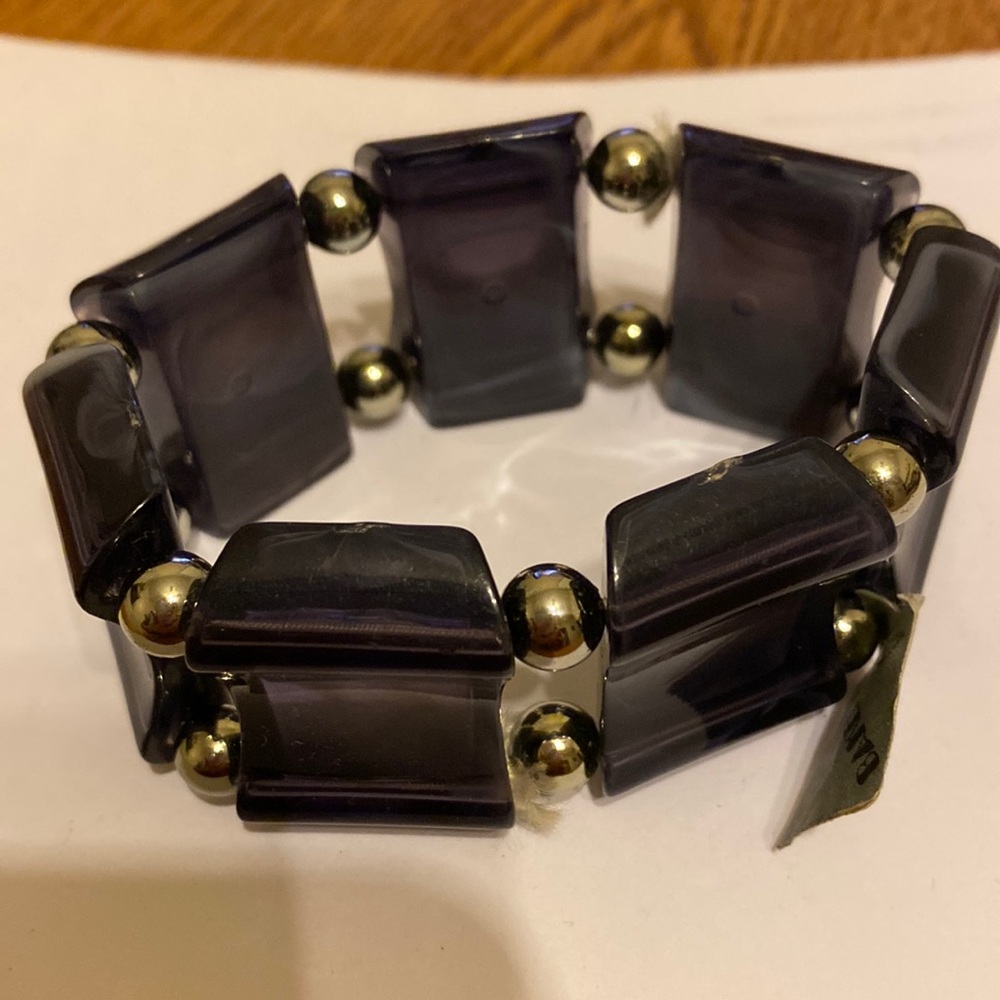Marked genuine Lucite stretch Purple Bracelet
